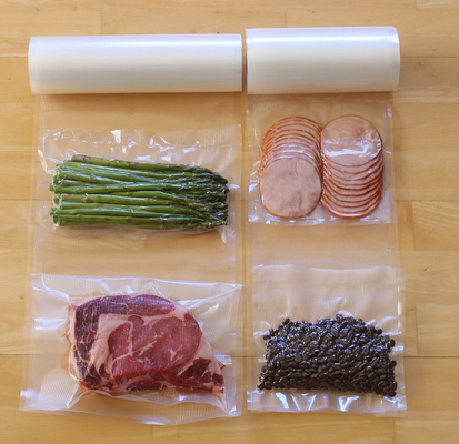 Food Grade Nylon Transparan Tas Segel Vakum Gulungan Makanan Segar Plastik Bertekstur